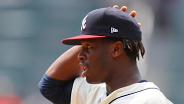 ATLANTA, GA - AUGUST 13: Touki Toussaint #62 of the Atlanta Braves walks on the field for his MLB debut during game one of a doubleheader against the Miami Marlins at SunTrust Park on August 13, 2018 in Atlanta, Georgia. (Photo by Kevin C. Cox/Getty Images)