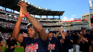 ATLANTA, GA - SEPTEMBER 22: Touki Toussaint #62 of the Atlanta Braves celebrates after clinching the NL East Division against the Philadelphia Phillies at SunTrust Park on September 22, 2018 in Atlanta, Georgia. (Photo by Daniel Shirey/Getty Images)