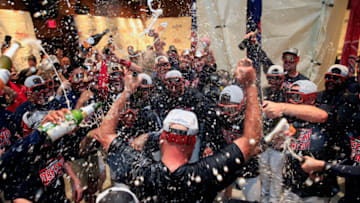 ATLANTA, GA - SEPTEMBER 22: Brian Snitker #43 of the Atlanta Braves celebrates with champagne after clinching the NL East Division against the Philadelphia Phillies at SunTrust Park on September 22, 2018 in Atlanta, Georgia. (Photo by Daniel Shirey/Getty Images)