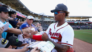 SURPRISE, AZ - NOVEMBER 03: AFL West All-Star, Cristian Pache #27 of the Atlanta Braves signs autographs before the Arizona Fall League All Star Game at Surprise Stadium on November 3, 2018 in Surprise, Arizona. (Photo by Christian Petersen/Getty Images)