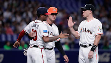 NAGOYA, JAPAN - NOVEMBER 15: Outfielder Ronald Acuna Jr. #13 of the Atlanta Braves is welcomed by Manager Don Mattingly #8 of the Miami Marlins and Deesignated hitter J.T. Realmuto #11 of the Miami Marlins as he is introduced prior to the game six between Japan and MLB All Stars at Nagoya Dome on November 15, 2018 in Nagoya, Aichi, Japan. (Photo by Kiyoshi Ota/Getty Images)
