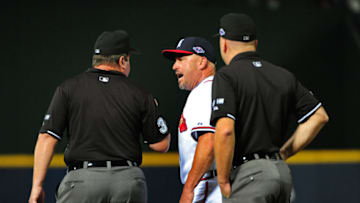 ATLANTA, GA - OCTOBER 5: Manager Fredi Gonzalez #33 of the Atlanta Braves disputes an infield fly ruling with umpires against the St. Louis Cardinals during the National League Wild Card Game at Turner Field on October 5, 2012 in Atlanta, Georgia. (Photo by Scott Cunningham/Getty Images)