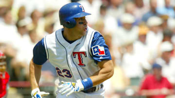 ARLINGTON, TX - APRIL 9: First baseman Mark Teixeira #23 of the Texas Rangers runs to first during the game against the Anaheim Angels at the Ballpark in Arlington on April 9, 2004 in Arlington, Texas. The Rangers won 12-4. (Photo by Ronald Martinez/Getty Images)