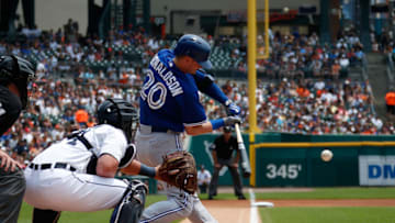 DETROIT, MI - JULY 05: Josh Donaldson #20 of the Toronto Blue Jays hits an RBI single in the first inning in front of catcher James McCann #34 of the Detroit Tigers at Comerica Park on July 5th 2015 in Detroit, Michigan. (Photo by Gregory Shamus/Getty Images)