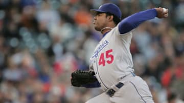 SAN FRANCISCO - JUNE 21: Pitcher Odalis Perez #45 of the Los Angeles Dodgers on the mound during the game against the San Francisco Giants at SBC Park on June 21, 2004 in San Francisco, California.The Giants won 3-2. (Photo by Jed Jacobsohn/Getty Images)