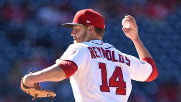 WASHINGTON, DC - JULY 08: Mark Reynolds #14 of the Washington Nationals pitches in the ninth inning during a baseball game against the Miami Marlins at Nationals Park on July 8, 2018 in Washington, DC. (Photo by Mitchell Layton/Getty Images)