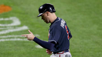 BALTIMORE, MARYLAND - SEPTEMBER 15: Freddie Freeman #5 of the Atlanta Braves celebrates after scoring in the ninth inning against the Baltimore Orioles at Oriole Park at Camden Yards on September 15, 2020 in Baltimore, Maryland. (Photo by Rob Carr/Getty Images)
