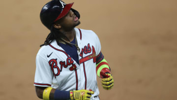 ARLINGTON, TEXAS - OCTOBER 16: Ronald Acuna Jr. #13 of the Atlanta Braves reacts after grounding out against the Los Angeles Dodgers during the fifth inning in Game Five of the National League Championship Series at Globe Life Field on October 16, 2020 in Arlington, Texas. (Photo by Tom Pennington/Getty Images)