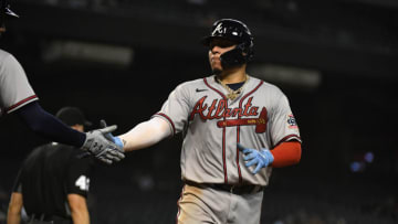 William Contreras #24 of the Atlanta Braves celebrates with teammates after scoring against the Arizona Diamondbacks. (Photo by Norm Hall/Getty Images)