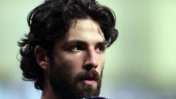 HOUSTON, TEXAS - NOVEMBER 02: Dansby Swanson #7 of the Atlanta Braves looks on against the Houston Astros during the ninth inning in Game Six of the World Series at Minute Maid Park on November 02, 2021 in Houston, Texas. (Photo by Carmen Mandato/Getty Images)
