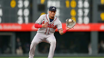 DENVER, CO - JUNE 3: Orlando Arcia #11 of the Atlanta Braves steps on second base and waits for the throw for a force out against the Colorado Rockies during a game at Coors Field on June 3, 2022 in Denver, Colorado. (Photo by Dustin Bradford/Getty Images)