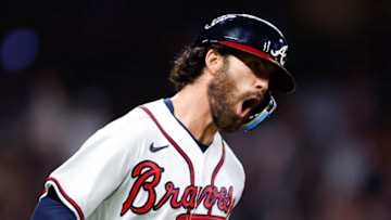 ATLANTA, GA - OCTOBER 01: Dansby Swanson #7 of the Atlanta Braves reacts after hitting a two run home run during the fifth inning against the New York Mets at Truist Park on October 1, 2022 in Atlanta, Georgia. (Photo by Todd Kirkland/Getty Images)