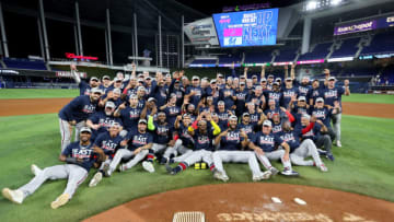 MIAMI, FLORIDA - OCTOBER 04: The Atlanta Braves pose for a group picture after clinching the division against the Miami Marlins at loanDepot park on October 04, 2022 in Miami, Florida. (Photo by Megan Briggs/Getty Images)