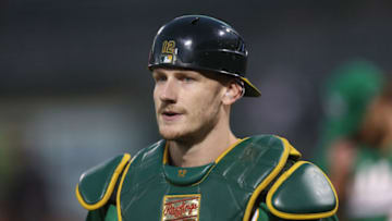 OAKLAND, CALIFORNIA - OCTOBER 04: Catcher Sean Murphy #12 of the Oakland Athletics looks on against the Los Angeles Angels at RingCentral Coliseum on October 04, 2022 in Oakland, California. (Photo by Lachlan Cunningham/Getty Images)