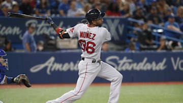 TORONTO, ON - AUGUST 30: Eduardo Nunez #36 of the Boston Red Sox hits a double in the first inning during MLB game action against the Toronto Blue Jays at Rogers Centre on August 30, 2017 in Toronto, Canada. (Photo by Tom Szczerbowski/Getty Images)