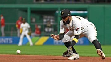 PITTSBURGH, PA - SEPTEMBER 01: Josh Harrison #5 of the Pittsburgh Pirates fields a ball off the bat of Billy Hamilton #6 of the Cincinnati Reds in the seventh inning during the game at PNC Park on September 1, 2017 in Pittsburgh, Pennsylvania. (Photo by Justin Berl/Getty Images)