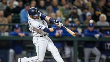 SEATTLE, WA - SEPTEMBER 20: Mitch Haniger #17 of the Seattle Mariners hits a solo home run off of starting pitcher Andrew Cashner #54 of the Texas Rangers during the third inning of a game at Safeco Field on September 20, 2017 in Seattle, Washington. (Photo by Stephen Brashear/Getty Images)