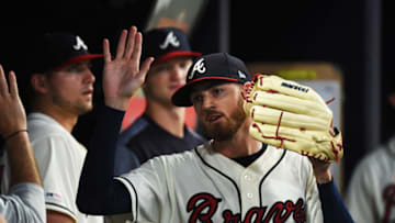 ATLANTA, GEORGIA - JULY 21: Kevin Gausman #45 of the Atlanta Braves is congratulated by his teammates in the 8th inning against the Washington Nationals at SunTrust Park on July 21, 2019 in Atlanta, Georgia. (Photo by Logan Riely/Getty Images)