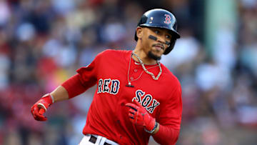 BOSTON, MASSACHUSETTS - SEPTEMBER 29: Mookie Betts #50 of the Boston Red Sox runs to first base during the fifth inning against the Baltimore Orioles at Fenway Park on September 29, 2019 in Boston, Massachusetts. (Photo by Maddie Meyer/Getty Images)