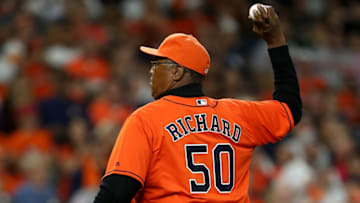 Atlanta Braves' nemesis J. R. Richard throws out the ceremonial first pitch prior for the ALCS. (Photo by Bob Levey/Getty Images)