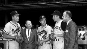 BRONX, NY - JULY 13: (L) Joe Adcock and Eddie Mathews (C) of the Milwaukee Braves and Bob Skinner of the Pittsburgh Pirates pose for a portrait with representives of Rawlings Sporting Goods prior to the MLB All-Star Game on July 13, 1960 at Yankee Stadium in the Bronx, New York. (Photo by Olen Collection/Diamond Images/Getty Images)