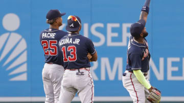 Former(?) Atlanta Braves left fielder Marcell Ozuna does his selfie thing while teammates look on. Mandatory Credit: Geoff Burke-USA TODAY Sports