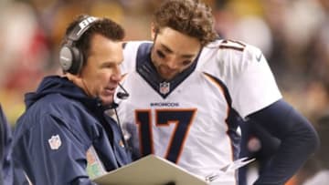Dec 20, 2015; Pittsburgh, PA, USA; Denver Broncos head coach Gary Kubiak (L) talks with quarterback Brock Osweiler (17) on the sidelines against the Pittsburgh Steelers during the fourth quarter at Heinz Field. The Steelers won 34-27. Mandatory Credit: Charles LeClaire-USA TODAY Sports