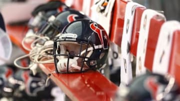 Aug 9, 2014; Glendale, AZ, USA; Detailed view of a Houston Texans helmet sits on the bench against the Arizona Cardinals during a preseason game at University of Phoenix Stadium. Mandatory Credit: Mark J. Rebilas-USA TODAY Sports