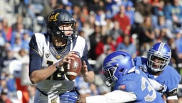 Dec 29, 2015; Fort Worth, TX, USA; California Golden Bears quarterback Jared Goff (16) avoids the rush of Air Force Falcons linebacker D. J. Dunn, Jr. in the second quarter of at Amon G. Carter Stadium. Mandatory Credit: Tim Heitman-USA TODAY Sports