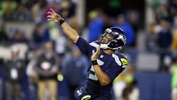 Sep 3, 2015; Seattle, WA, USA; Seattle Seahawks quarterback B.J. Daniels (5) passes against the Oakland Raiders during the fourth quarter at CenturyLink Field. Mandatory Credit: Joe Nicholson-USA TODAY Sports