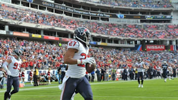 Dec 27, 2015; Nashville, TN, USA; Houston Texans strong safety Quintin Demps (27) picks up the ball fumbled by Tennessee Titans running back Antonio Andrews (26) (not pictured) and runs for a touchdown during the first half at Nissan Stadium. Mandatory Credit: Jim Brown-USA TODAY Sports