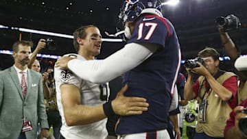 Aug 20, 2016; Houston, TX, USA; New Orleans Saints quarterback Drew Brees (9) shakes hands with quarterback Brock Osweiler (17) after a game at NRG Stadium. The Texans won 16-9. Mandatory Credit: Troy Taormina-USA TODAY Sports