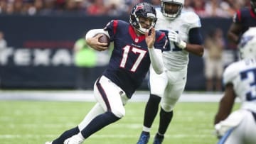 Oct 2, 2016; Houston, TX, USA; Houston Texans quarterback Brock Osweiler (17) runs with the ball on a keeper during the fourth quarter against the Tennessee Titans at NRG Stadium. The Texans won 27-20. Mandatory Credit: Troy Taormina-USA TODAY Sports