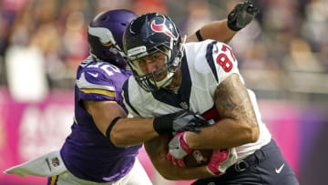 Oct 9, 2016; Minneapolis, MN, USA; Houston Texans tight end C.J. Fiedorowicz (87) catches a pass as Minnesota Vikings linebacker Chad Greenway (52) tackles him in the second quarter at U.S. Bank Stadium. The Vikings win 31-13. Mandatory Credit: Bruce Kluckhohn-USA TODAY Sports