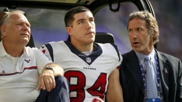 Oct 9, 2016; Minneapolis, MN, USA; Houston Texans tight end Ryan Griffin (84) leaves the game against the Minnesota Vikings with medical personnel at U.S. Bank Stadium. The Vikings win 31-13. Mandatory Credit: Bruce Kluckhohn-USA TODAY Sports