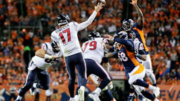 Oct 24, 2016; Denver, CO, USA; Houston Texans quarterback Brock Osweiler (17) passes as offensive guard Jeff Allen (79) defends against Denver Broncos outside linebacker Von Miller (58) and free safety Darian Stewart (26) in the second quarter at Sports Authority Field at Mile High. Mandatory Credit: Isaiah J. Downing-USA TODAY Sports
