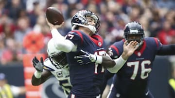 Nov 27, 2016; Houston, TX, USA; Houston Texans quarterback Brock Osweiler (17) is hit by San Diego Chargers outside linebacker Melvin Ingram (54) on a play during the first quarter at NRG Stadium. Mandatory Credit: Troy Taormina-USA TODAY Sports