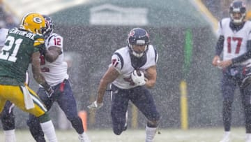 Dec 4, 2016; Green Bay, WI, USA; Houston Texans running back Jonathan Grimes (41) rushes with the football during the third quarter against the Green Bay Packers at Lambeau Field. Green Bay won 21-13. Mandatory Credit: Jeff Hanisch-USA TODAY Sports
