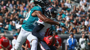 JACKSONVILLE, FL - OCTOBER 21: DeAndre Hopkins #10 of the Houston Texans hauls in a second half touchdown while being defended by Jalen Ramsey #20 of the Jacksonville Jaguars at TIAA Bank Field on October 21, 2018 in Jacksonville, Florida. (Photo by Scott Halleran/Getty Images)