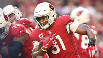 GLENDALE, ARIZONA - DECEMBER 23: David Johnson #31 of the Arizona Cardinals runs with the football in the first half of the NFL game against the Los Angeles Rams at State Farm Stadium on December 23, 2018 in Glendale, Arizona. (Photo by Christian Petersen/Getty Images)