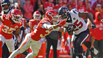 KANSAS CITY, MO - OCTOBER 13: Running back Duke Johnson #25 of the Houston Texans rushes up field against pressure from strong safety Tyrann Mathieu #32 of the Kansas City Chiefs during the second half at Arrowhead Stadium on October 13, 2019 in Kansas City, Missouri. (Photo by Peter Aiken/Getty Images)