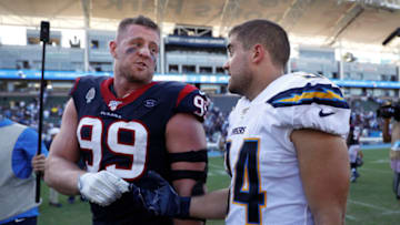 J.J. Watt #99 of the Houston Texans and brother Derek Watt (Photo by Meg Oliphant/Getty Images)