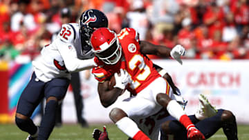 KANSAS CITY, MISSOURI - OCTOBER 13: Lonnie Johnson #32 and Tashaun Gipson #39 of the Houston Texans attempt to tackle Byron Pringle #13 of the Kansas City Chiefs during the first half at Arrowhead Stadium on October 13, 2019 in Kansas City, Missouri. (Photo by Jamie Squire/Getty Images)