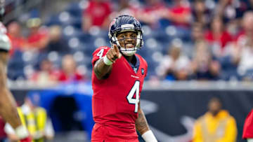 HOUSTON, TX - DECEMBER 8: Deshaun Watson #4 of the Houston Texans points to a receiver during the second half of a game against the Denver Broncos at NRG Stadium on December 8, 2019 in Houston, Texas. The Broncos defeated the Texans 38-24. (Photo by Wesley Hitt/Getty Images)