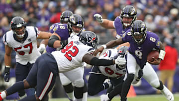 BALTIMORE, MARYLAND - NOVEMBER 17: Quarterback Lamar Jackson #8 of the Baltimore Ravens rushes against the Houston Texans during the second quarter at M&T Bank Stadium on November 17, 2019 in Baltimore, Maryland. (Photo by Patrick Smith/Getty Images)