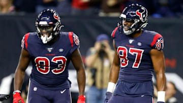 HOUSTON, TEXAS - DECEMBER 01: Darren Fells #87 of the Houston Texans celebrates with teammate Jordan Thomas #83 after scoring a touchdown against the New England Patriots during the second quarter in the game at NRG Stadium on December 01, 2019 in Houston, Texas. (Photo by Bob Levey/Getty Images)