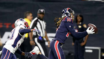 HOUSTON, TEXAS - DECEMBER 01: Will Fuller #15 of the Houston Texans catches a pass in the end zone during the third quarter that was ruled a touchdown against the New England Patriots at NRG Stadium on December 01, 2019 in Houston, Texas. New England challenged the play and it was ruled an incomplete pass. (Photo by Bob Levey/Getty Images)