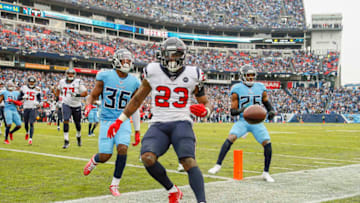 NASHVILLE, TENNESSEE - DECEMBER 15: Carlos Hyde #23 of the Houston Texans runs into the end zone for a touchdown against LeShaun Sims #36 of the Tennessee Titans during the second half at Nissan Stadium on December 15, 2019 in Nashville, Tennessee. (Photo by Frederick Breedon/Getty Images)