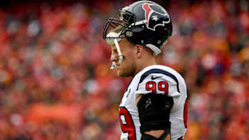 KANSAS CITY, MISSOURI - JANUARY 12: J.J. Watt #99 of the Houston Texans looks on from the sidelines during the AFC Divisional playoff game against the Kansas City Chiefs at Arrowhead Stadium on January 12, 2020 in Kansas City, Missouri. (Photo by Peter Aiken/Getty Images)