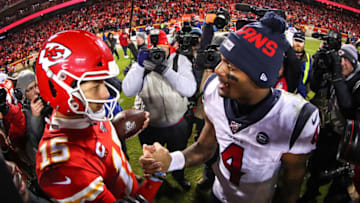 KANSAS CITY, MISSOURI - JANUARY 12: Will Fuller V #15 of the Houston Texans and Deshaun Watson #4 of the Houston Texans shake hands following the AFC Divisional playoff game at Arrowhead Stadium on January 12, 2020 in Kansas City, Missouri. (Photo by Tom Pennington/Getty Images)